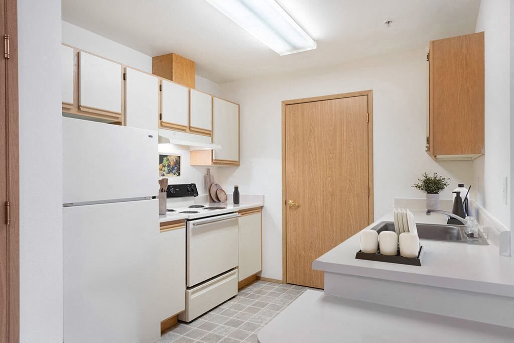 Kitchen with fridge at Boardwalk in Olympia WA